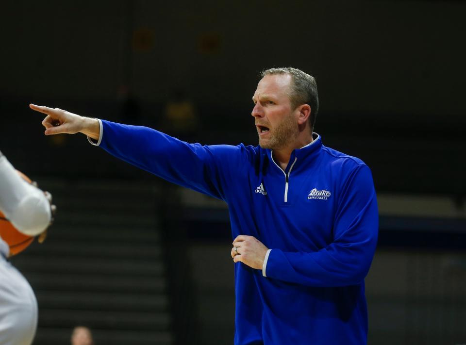 Drake University head men's basketball coach Darian DeVries calls out to his players in the second half against Mount Marty in December 2021.
