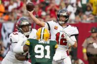 Tampa Bay Buccaneers' Tom Brady thorws during the second half of an NFL football game against the Green Bay Packers Sunday, Sept. 25, 2022, in Tampa, Fla. (AP Photo/Chris O'Meara)