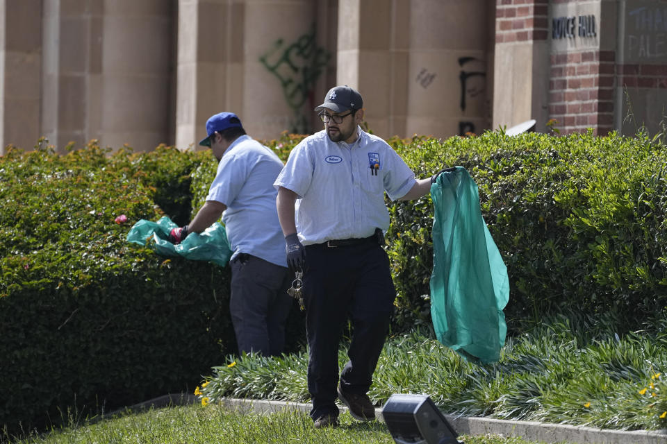 Cleanup continues on the site of a pro-Palestinian encampment, cleared by police overnight, on the UCLA campus Thursday, May 2, 2024, in Los Angeles. (AP Photo/Mark J. Terrill)