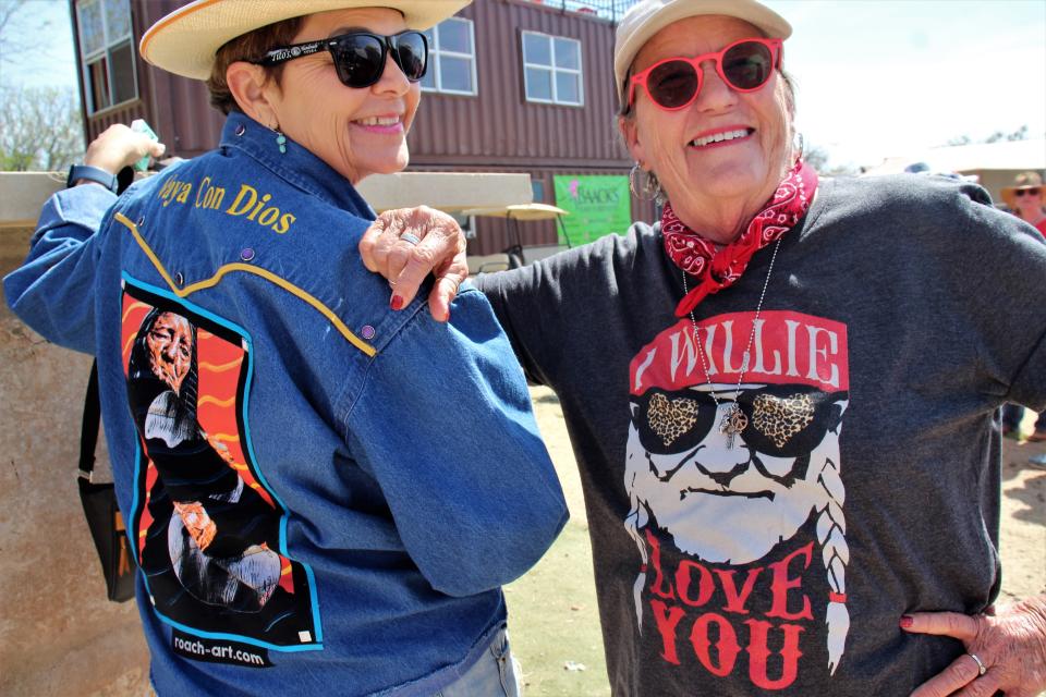 Danna Dunagin, left, and Jeanie West of Merkel arrived at the Outlaws & Legends Music Festival early Saturday but said, "We're just here for Willie." They showed off their Willie gear, including art on Dunagin's denim jacket by local artist Chuck Roach.