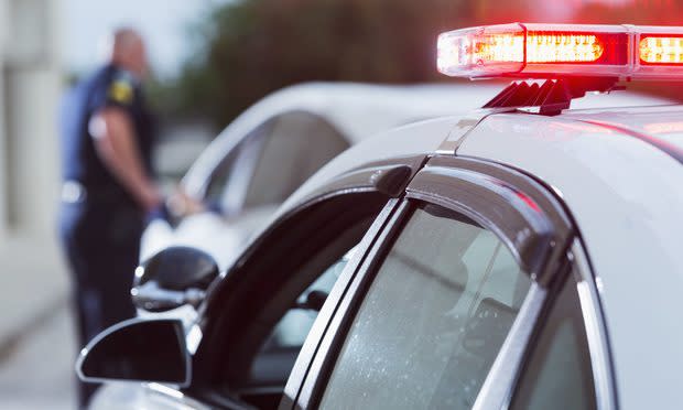 police car, police stop - iStock/Susan Chiang