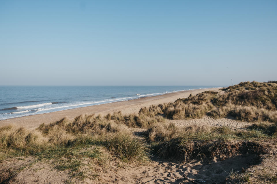 View from the hill over Hemsby beach, Norfolk, UK, on a sunny spring day.