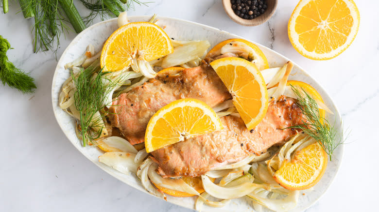 salmon with orange, fennel on platter