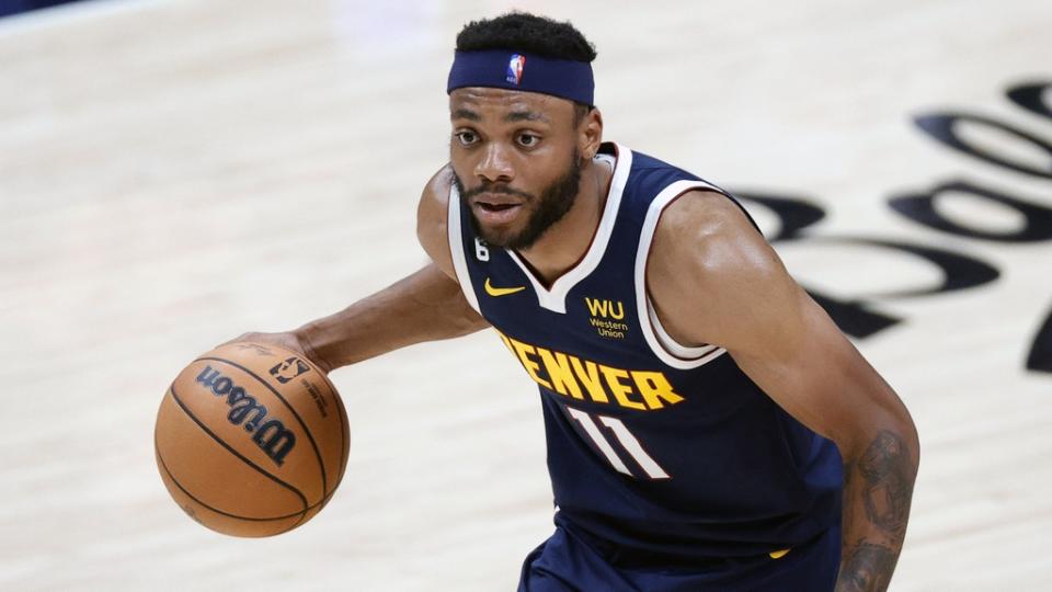 Denver Nuggets forward Bruce Brown (11) controls the ball against the Miami Heat in the second quarter in game two of the 2023 NBA Finals at Ball Arena