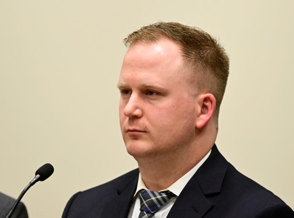 Police officer Nathan Woodyard attends an arraignment hearing after being charged in the 2019 death of Elijah McClain, Jan. 20, 2023, at the Adams County Justice Center in Brighton, Colorado.