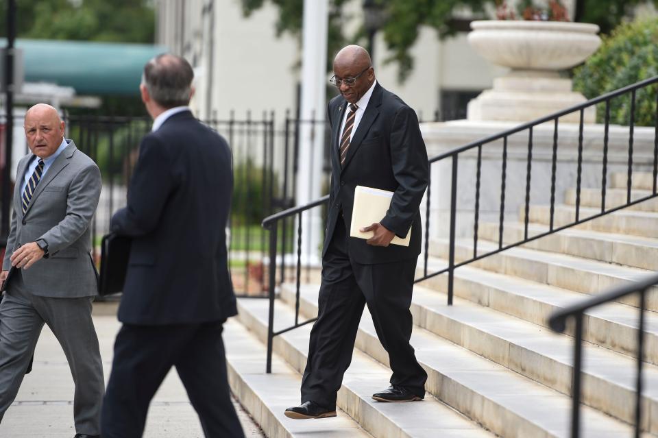 Indicted Augusta Commissioner Sammie Sias, right, walks down the steps with his lawyers, Kenneth D. Crowder, left, and David Stewart, center, after a pretrial conference the U.S. District Court for Southern District of Georgia courthouse in Augusta on Thursday, July 14, 2022. Sias is under indictment for destroying evidence and lying to a FBI agent during an investigation of misuse of sales tax funds.