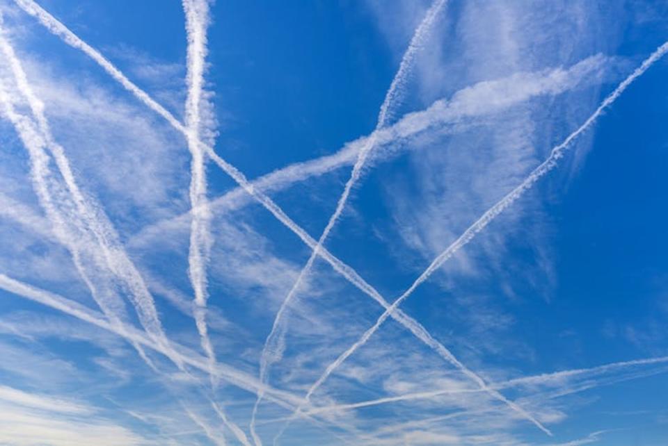 Contrails, otherwise known as manmade cirrus  (Shutterstock)