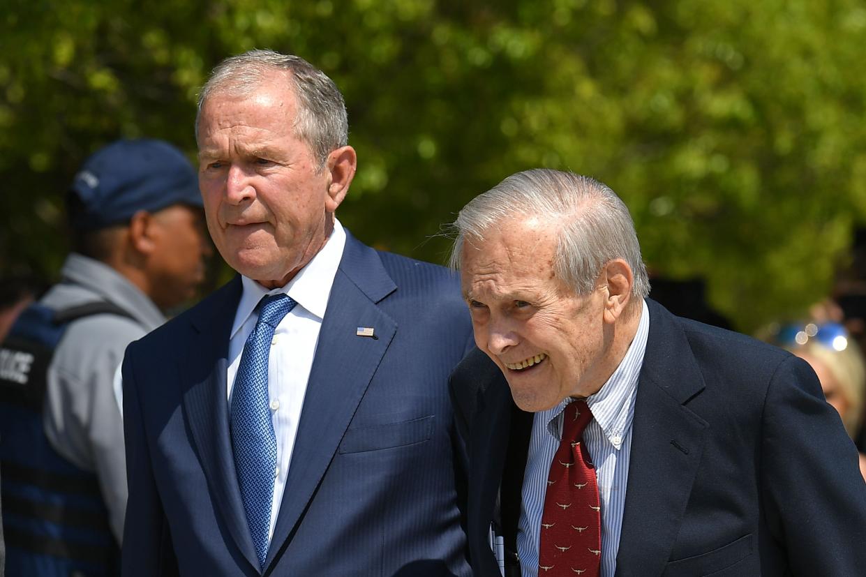 Former President George W. Bush (left) and former Defense Secretary Donald Rumsfeld (right)