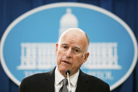 California Governor Jerry Brown speaks to reporters while proposing his 2015-16 state budget in Sacramento, California, January 9, 2015. REUTERS/Max Whittaker