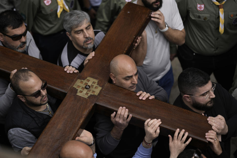 Christians walk the Way of the Cross procession that commemorates Jesus Christ's crucifixion on Good Friday, in the Old City of Jerusalem, Friday, March 29, 2024. (AP Photo/Leo Correa)