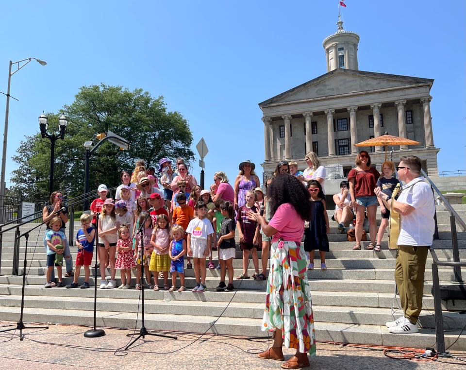 Ruby Amanfu, a Nashville-based Grammy-nominated recording artist, led a choir of children in a singalong outside the state Capitol Sunday, Aug. 20, 2023 ahead of the special legislation on public safety.