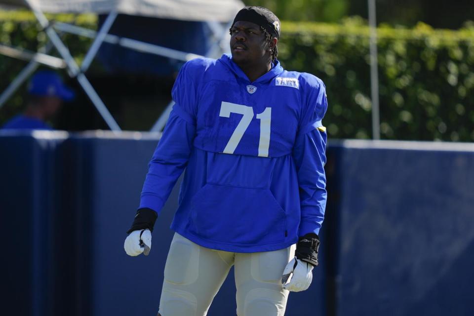 Rams offensive tackle Warren McClendon Jr. stands on the sideline during training camp in July.