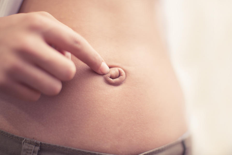Would you go under the knife to change your belly button? [Photo: Getty]