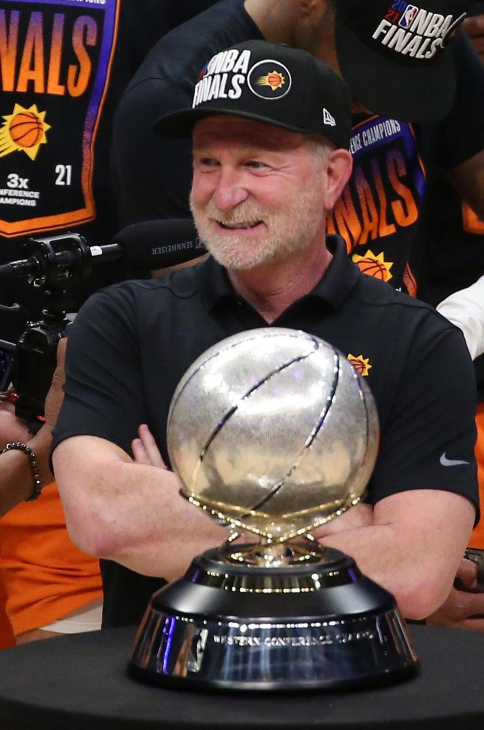 Phoenix Suns owner Robert Sarver smiles before receiving the Western Conference trophy after beating the LA Clippers in Game 6 at STAPLES Center June 30, 2021.