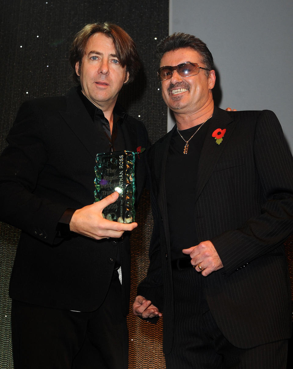 George Michael (right) presents Jonathan Ross with the 2009 Music Industry Trusts' Award at the Grosvenor House Hotel on Park Lane, London.