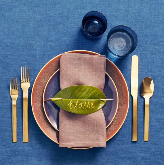 Pictured: Royal Crown Derby dinner plate, in Flamed Caramel, $46; and salad plate, in Pressed Mulberry, $38, jungleeny.com. Hawkins New York Highland flatware, in Gold, $90 for a 5-piece set, hawkinsnewyork.com. Studio Natural Ieva Krakel linen napkin, in Light Pink Anthracite, $50, abchome.com. Loops & Threads doublepoint knitting needle, 7