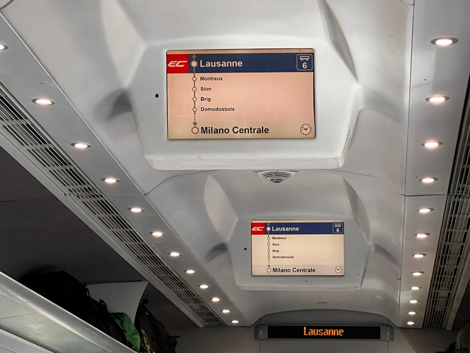 electronic signs in a european train car