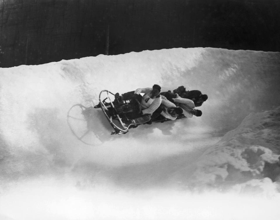 The British four-man bobsleigh team in action at the Winter Olympics at Chamonix, February 1924. The team, Ralph Broome, Thomas Arnold, Alexander Richardson and Rodney Soher, took silver in the event.