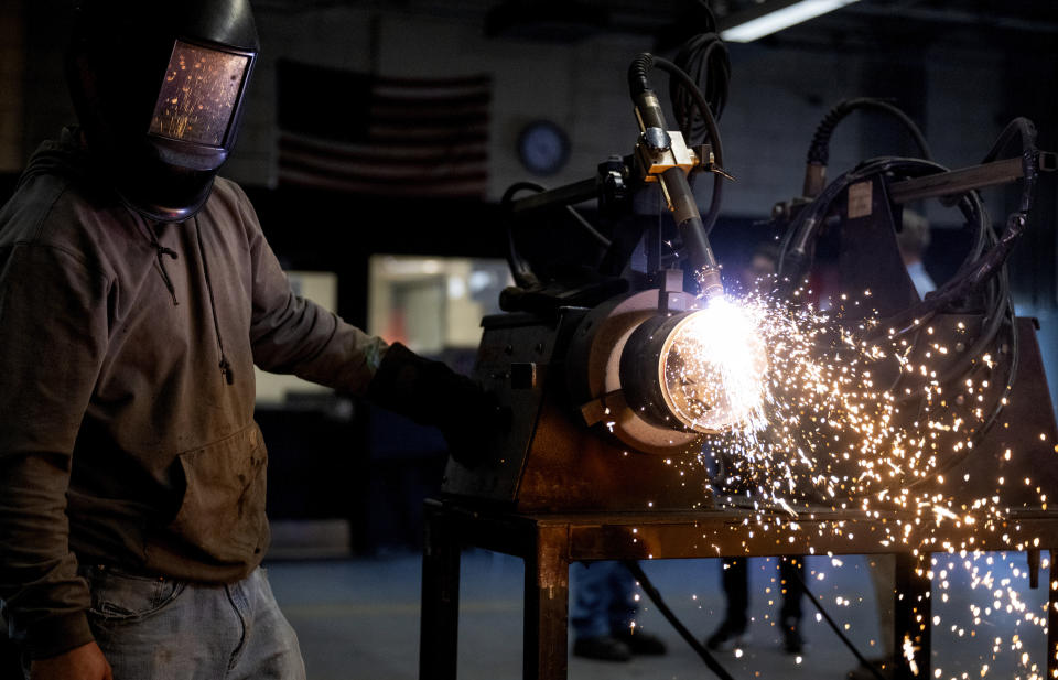 Cruze Ponce, a student of Hendry County Adult Learning participating in the welding program, continues to perfect his skills during his class project on Thursday, March 14 ,2024. The program helps adults gain the necessary experience to receive certification and immediately enter the local workforce after completion. Clewiston, Fla. (AP Photo/Chris Tilley)