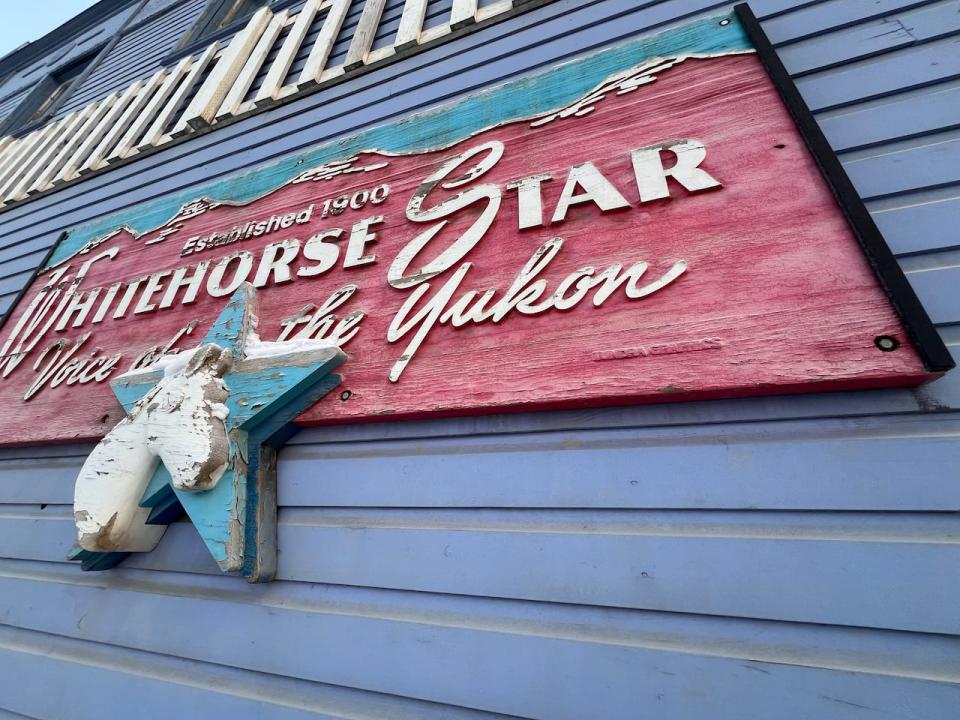 A sign on the Whitehorse Star's office building in Whitehorse.