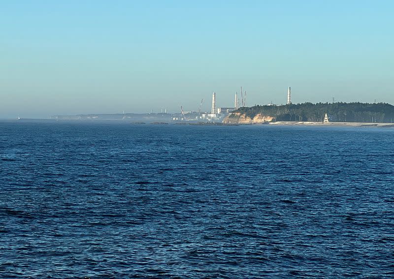 FILE PHOTO: A view of the Fukushima Daiichi nuclear power plant seen from the nearby Ukedo fishing port in Namie town