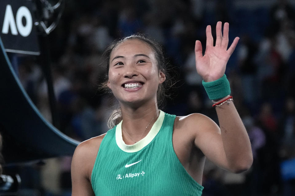 FILE - Zheng Qinwen, of China, celebrates after defeating Dayana Yastremska, of Ukraine, in semifinal match at the Australian Open tennis championships at Melbourne Park, Melbourne, Australia, Thursday, Jan. 25, 2024. Zheng was the runner-up at the year’s first Grand Slam tournament, the Australian Open, and is one of the top women’s tennis players at the French Open, which starts Sunday at Roland Garros in Paris. (AP Photo/Alessandra Tarantino, File)