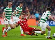 Soccer Football - Champions League - Bayern Munich vs Celtic - Allianz Arena, Munich, Germany - October 18, 2017 Bayern Munich's Arjen Robben in action with Celtic’s Scott Brown and Kieran Tierney REUTERS/Michaela Rehle