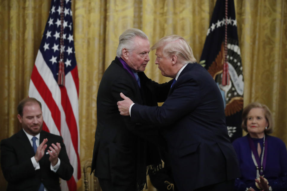 President Donald Trump greets Jon Voight during a National Medal of Arts and National Humanities Medal ceremony in the East Room of the White House, Thursday, Nov. 21, 2019, in Washington. (AP Photo/Alex Brandon)