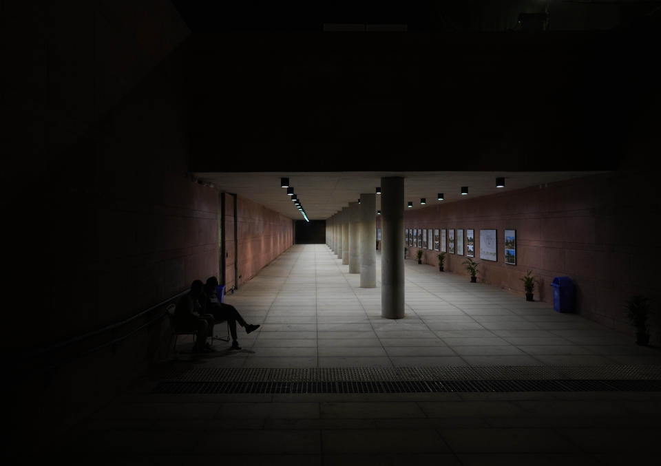 A security man guards a newly constructed under pass of the revamped Central Vista Avenue at the India Gate, in New Delhi, India, Thursday, Sept. 8, 2022. On Thursday, India’s Prime Minister Narendra Modi urged the country to shed its colonial ties in a ceremony to rename Rajpath, a boulevard that was once called Kingsway after King George V, Modi called it a "symbol of slavery" under the British Raj. (AP Photo/Manish Swarup)