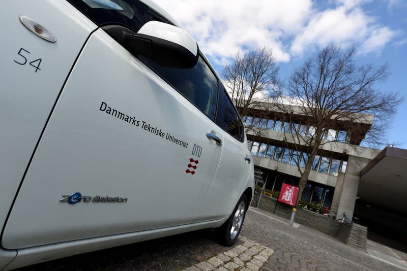 An E-car is seen in front of the main building of the Technical University of Denmark in Copenhagen