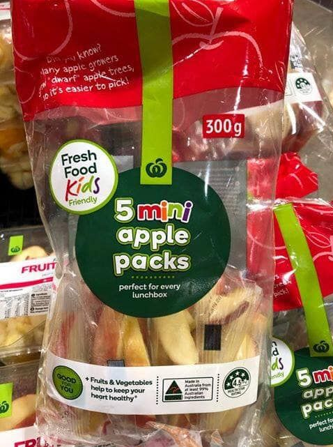 Mini fruit packaged in plastic inside Woolworths as shoppers express outrage at inconsistent messaging.