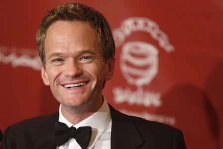 Actor Neil Patrick Harris meets the media after he was honored as Hasty Pudding Theatricals' Man of the Year during a roast at Harvard University in Cambridge, Massachusetts, in this February 7, 2014, file photo. REUTERS/Dominick Reuter/Files