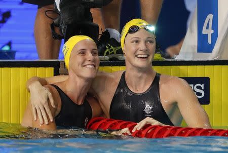 FILE PHOTO - Swimming - Gold Coast 2018 Commonwealth Games - Women's 50m Freestyle Semifinal 2 - Optus Aquatic Centre - Gold Coast, Australia - April 6, 2018 - Cate Campbell and Bronte Campbell of Australia. REUTERS/David Gray