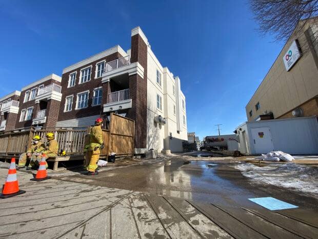 A semi-truck crashed into power lines in the alley behind the 2500 block of Broad Street.  (Kirk Fraser/CBC - image credit)