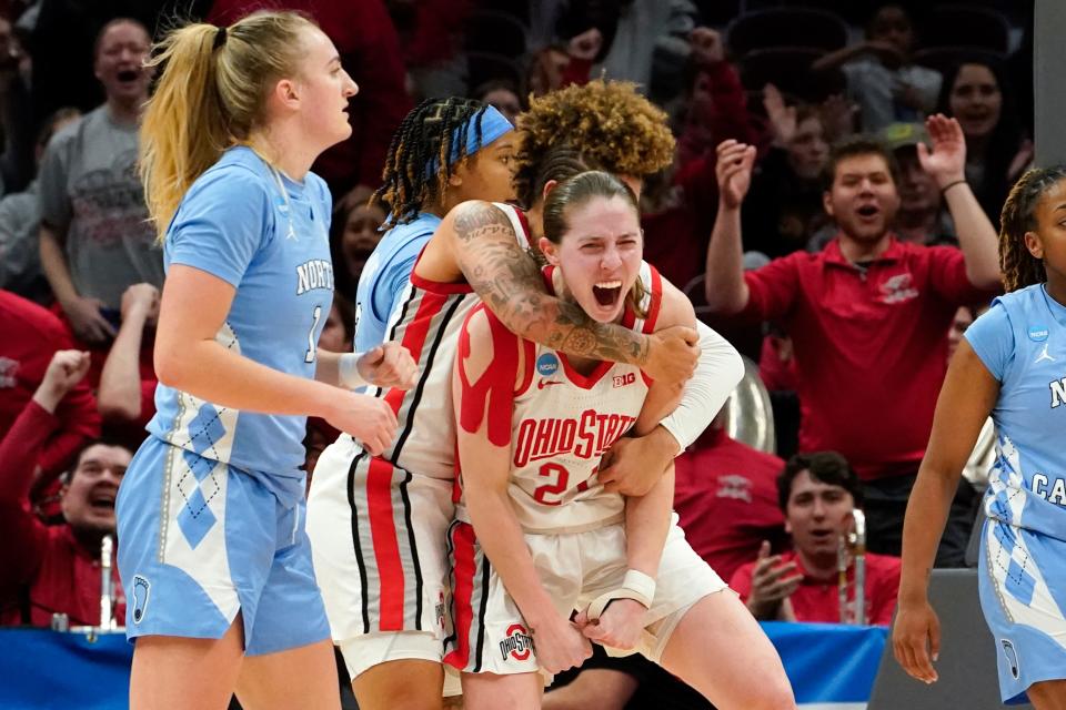Ohio State guard Taylor Mikesell (24) reacts to being fouled on a basket with Rikki Harris in the second half of a second-round NCAA Tournament game against North Carolina, Monday, March 20, 2023, in Columbus.