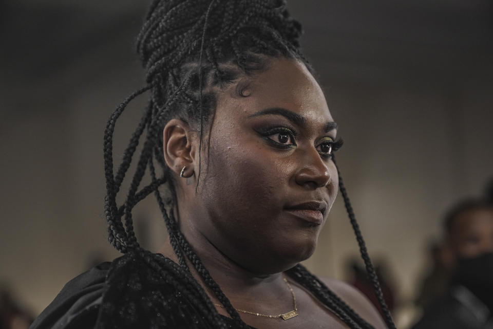 Actress Danielle Brooks listens during an interview before attending Christian Siriano's fall/winter 2022 fashion show during Fashion Week, Saturday Feb. 12, 2022, in New York. (AP Photo/Bebeto Matthews)