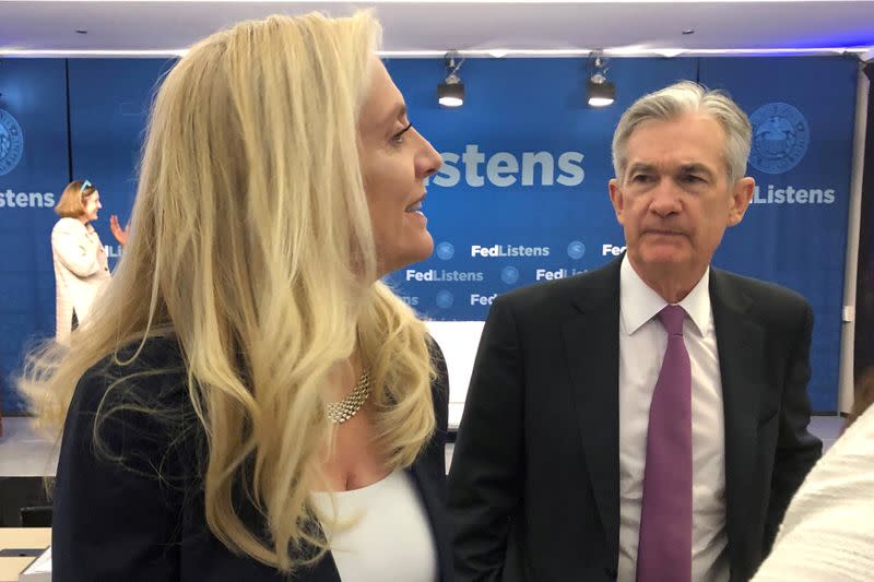 FILE PHOTO: Federal Reserve Chairman Jerome Powell speaks with Fed Governor Lael Brainard at the Federal Reserve Bank of Chicago