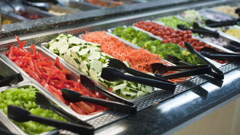 salad buffet with tongs