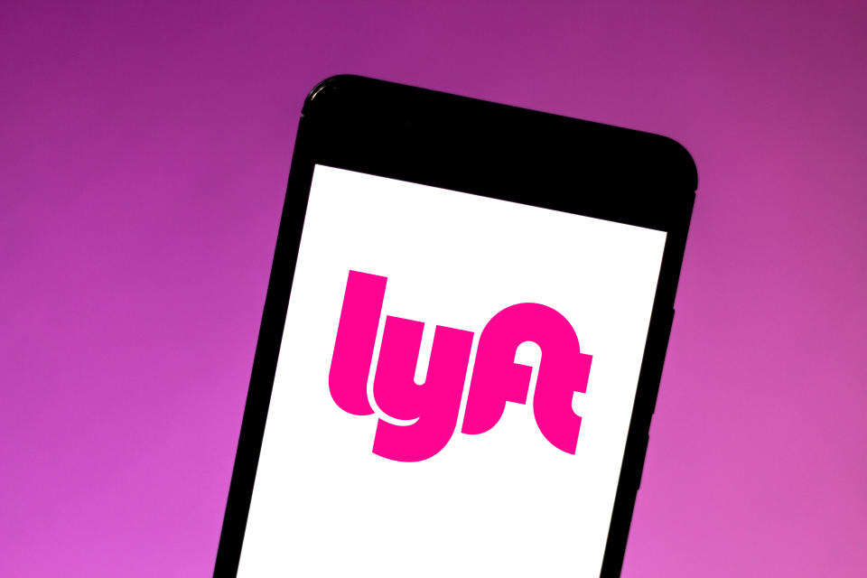 BRAZIL - 2019/05/24: In this photo illustration the Lyft logo is seen displayed on a smartphone. (Photo Illustration by Rafael Henrique/SOPA Images/LightRocket via Getty Images)