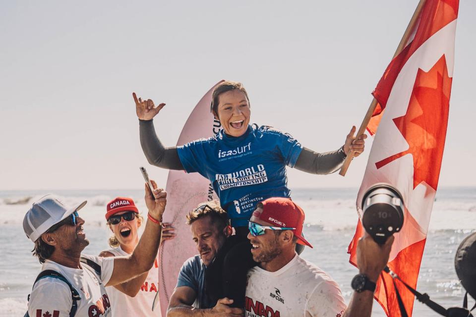 Vancouver native Victoria Feige celebrates her fifth straight world title at the Para surfing world championships on Saturday in Huntington Beach, Calif.