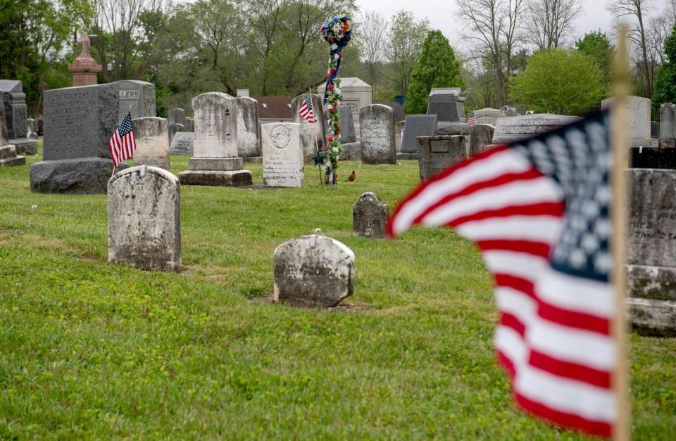 Flags wave in the wind at the Boalsburg cemetery on Friday, May 22, 2020.