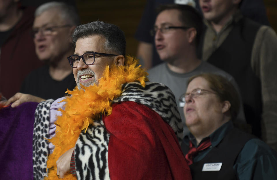 Richard Ortiz, a member of the Out Loud Colorado Springs Men's Chorus, performs during a Christmas show rehearsal in Colorado Springs, Colo., on Wednesday, Nov. 30, 2022. The group has taken an active role in the healing process after a Nov. 19 attack killed five people at an LGBTQ nightclub in Colorado Springs. (AP Photo/Thomas Peipert)