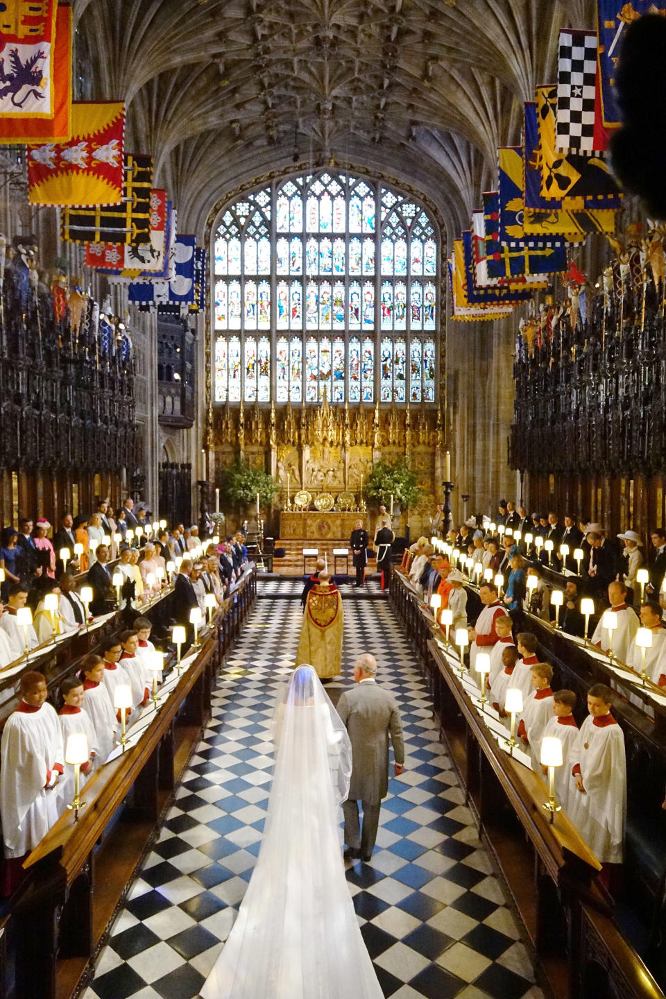 Prince Charles accompanies Meghan down the aisle