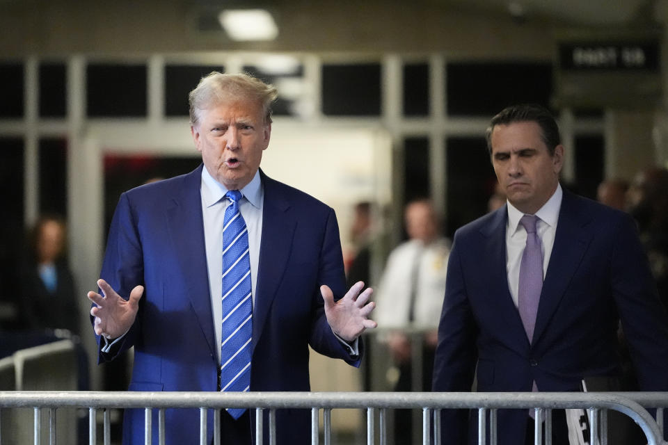 Former President Donald Trump speaks before entering the courtroom at Manhattan criminal court, Tuesday, April 16, 2024, in New York. Donald Trump returned to the courtroom Tuesday as a judge works to find a panel of jurors who will decide whether the former president is guilty of criminal charges alleging he falsified business records to cover up a sex scandal during the 2016 campaign. (AP Photo/Mary Altaffer)