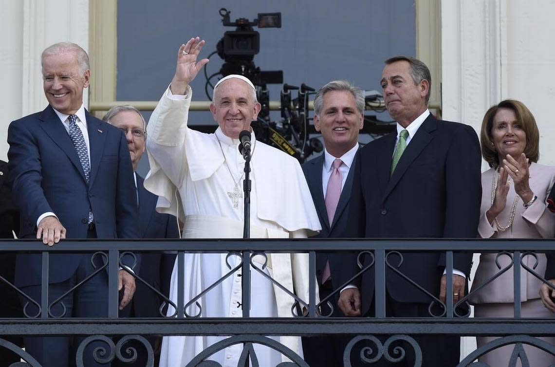 Pope Francis, center, waves to the crowd on Capitol Hill during a 2015 U.S. visit. Susan Walsh / The Associated Press