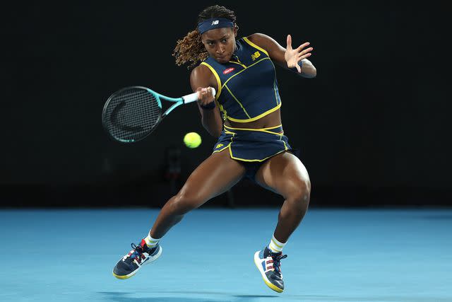 <p>Cameron Spencer/Getty</p> Coco Gauff competing in the 2024 Australia Open on Jan. 25, 2024