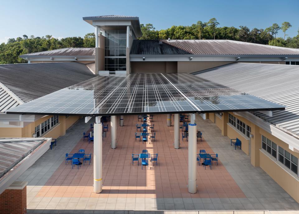 TCC's Ghazvini Center has a solar roof over its patio to give healthcare students shaded seating.