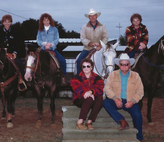 <p>Reba McEntire Instagram </p> Reba McEntire with her siblings Susie, Pake and Alice, and her parents Jacqueline Smith McEntire and Clark McEntire.