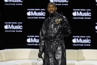 Usher poses for photographers during a news conference ahead of the Super Bowl 58 NFL football game Thursday, Feb. 8, 2024, in Las Vegas. Usher will perform during the Super Bowl halftime show. (AP Photo/John Locher)