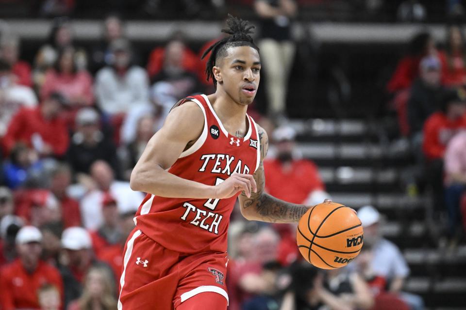 Texas Tech guard Chance McMillian brings the ball up court against Baylor during the first half of an NCAA college basketball game Saturday, March 9, 2024, in Lubbock, Texas. (AP Photo/Justin Rex)